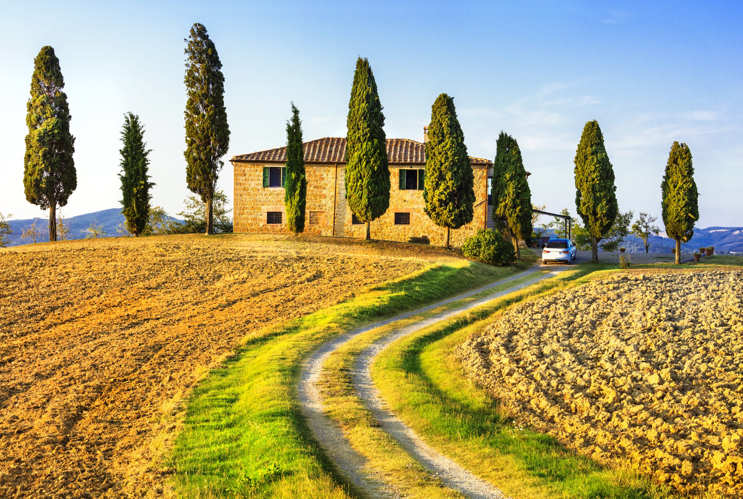 Tuscan farmhouse among cypresses